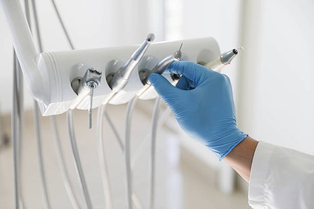 Professional Tooth Extraction technician working in South Huntington, NY